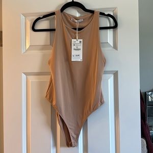 Rand new Zara body suit